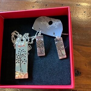 Silver coloured metal necklace and earrings set. Not sterling silver.
